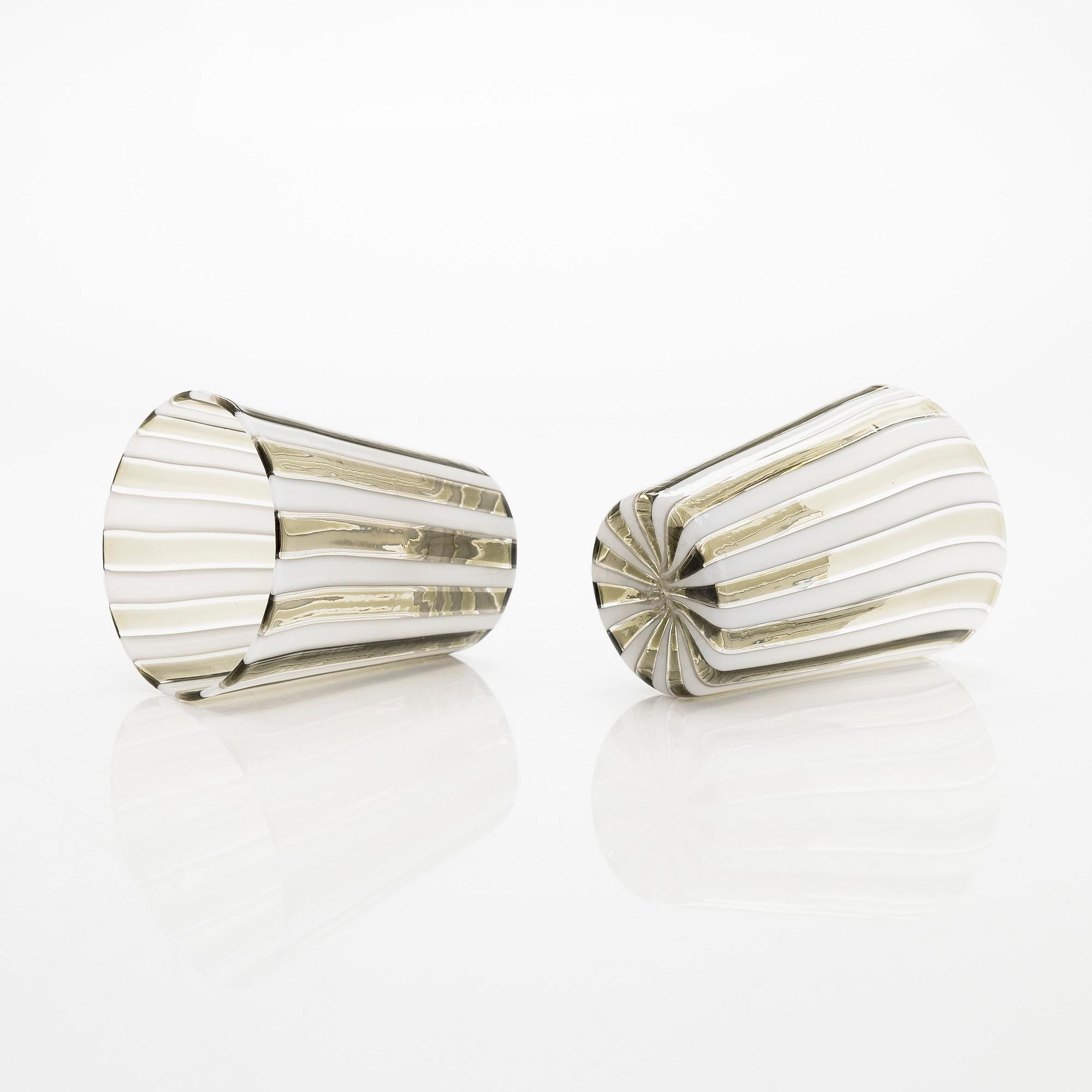 Gio Ponti, a glass bottle '4500' signed Venini, Murano and three drinking glasses, Italy.