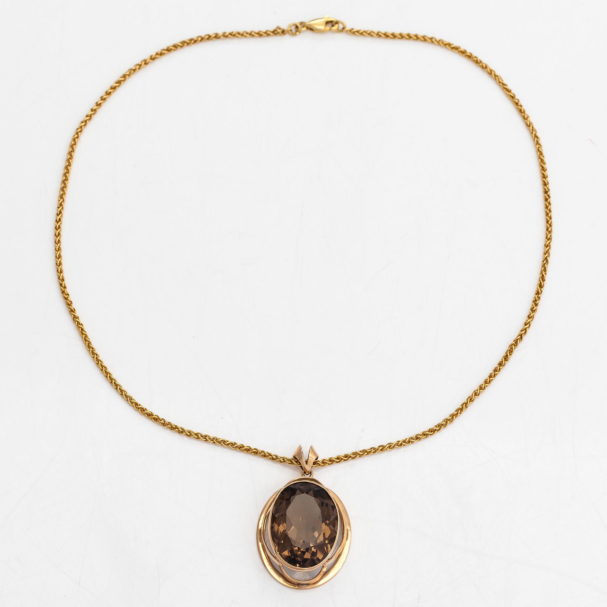 Halsband, 14K och 18K guld och rökkvarts. Olavi Nupponen, Helsingfors 1963 och Tillander Helsingfors 1996.