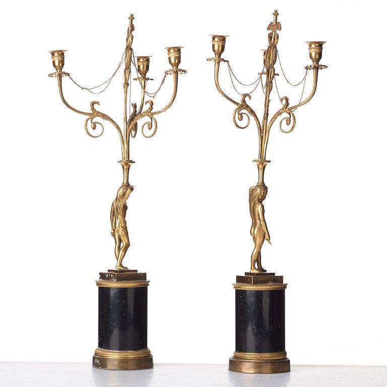 A pair of late Gustavian three-light chandeliers, circa 1800.