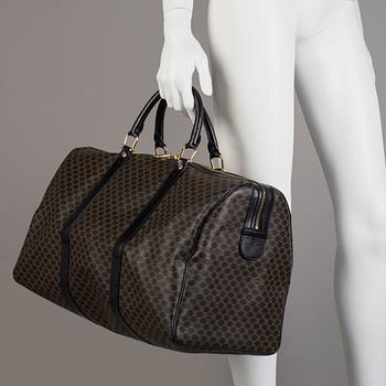 a CÉLINE weekend bag.