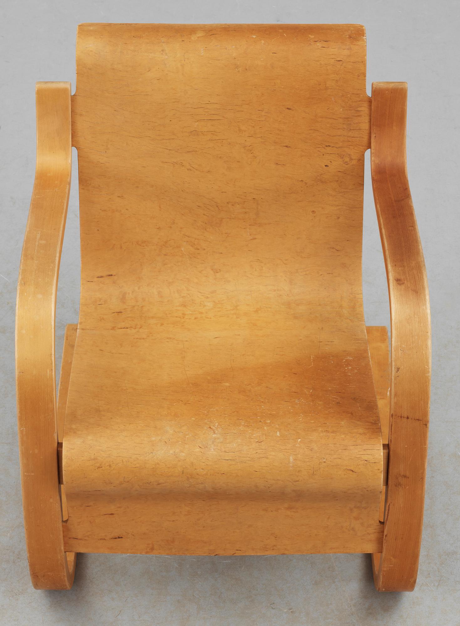 An Alvar Aalto birch armchair by O.y Huonekalu-ja Rakennustyötehdas A.B,