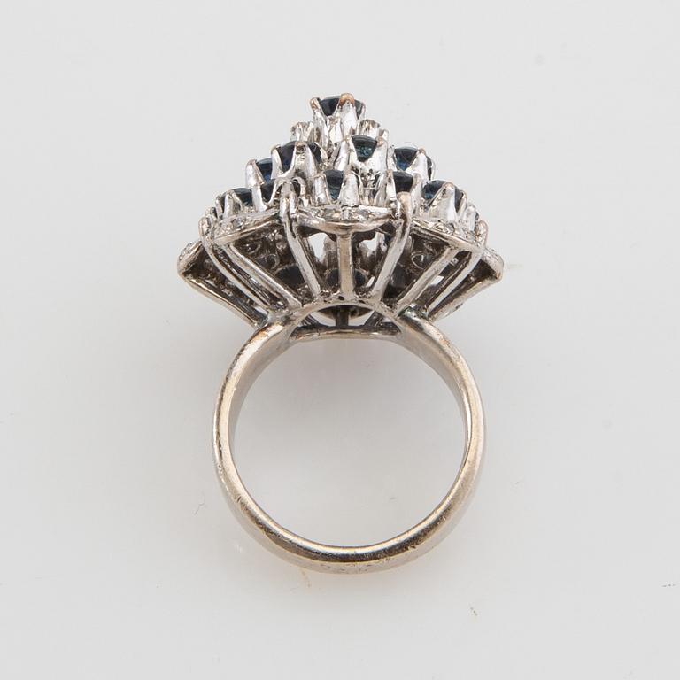 Ring 8K white gold with diamonds and sapphires.