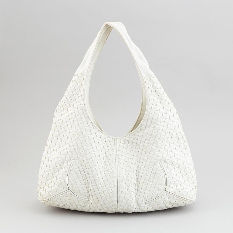 Bottega Veneta, a white intrecciato leather hobo bag.
