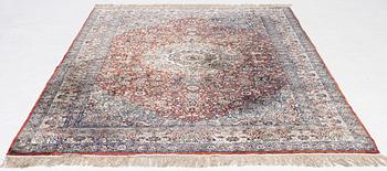 Carpet, part silk, approx. 240 x 158 cm.