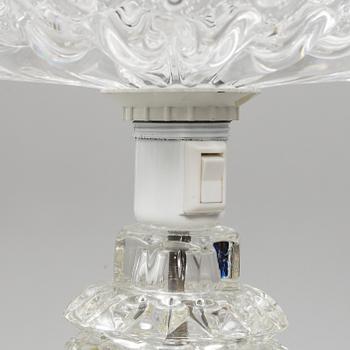 A glass floor lamp.