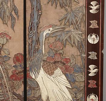 A coromandel black-lacquer four panel screen, Qing Dynasty (1644-1912).