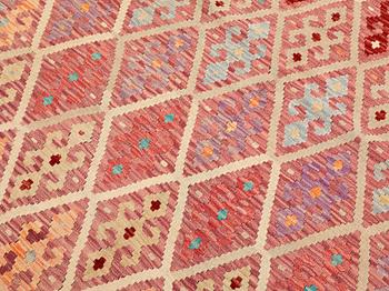 A Kelim carpet, c. 240 x 175 cm.