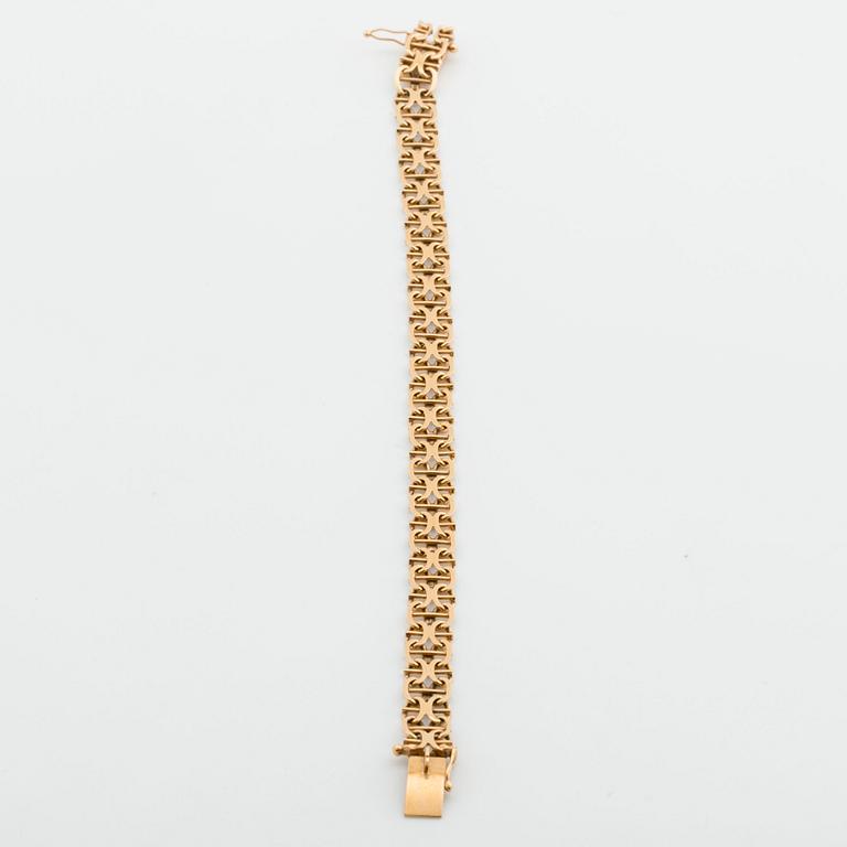 ARMBAND 18K guld x-länk med stav, Stockholm 1968.