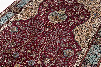 A Tabriz carpet, north-western Iran, figural, c. 270 x 180 cm.