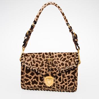 An Animal Print Pony Hair Shoulder Bag.