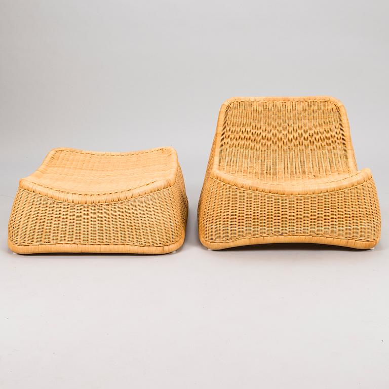 NANNA DITZEL, a 21st century Danish 'Chill' lounge chair with stool.