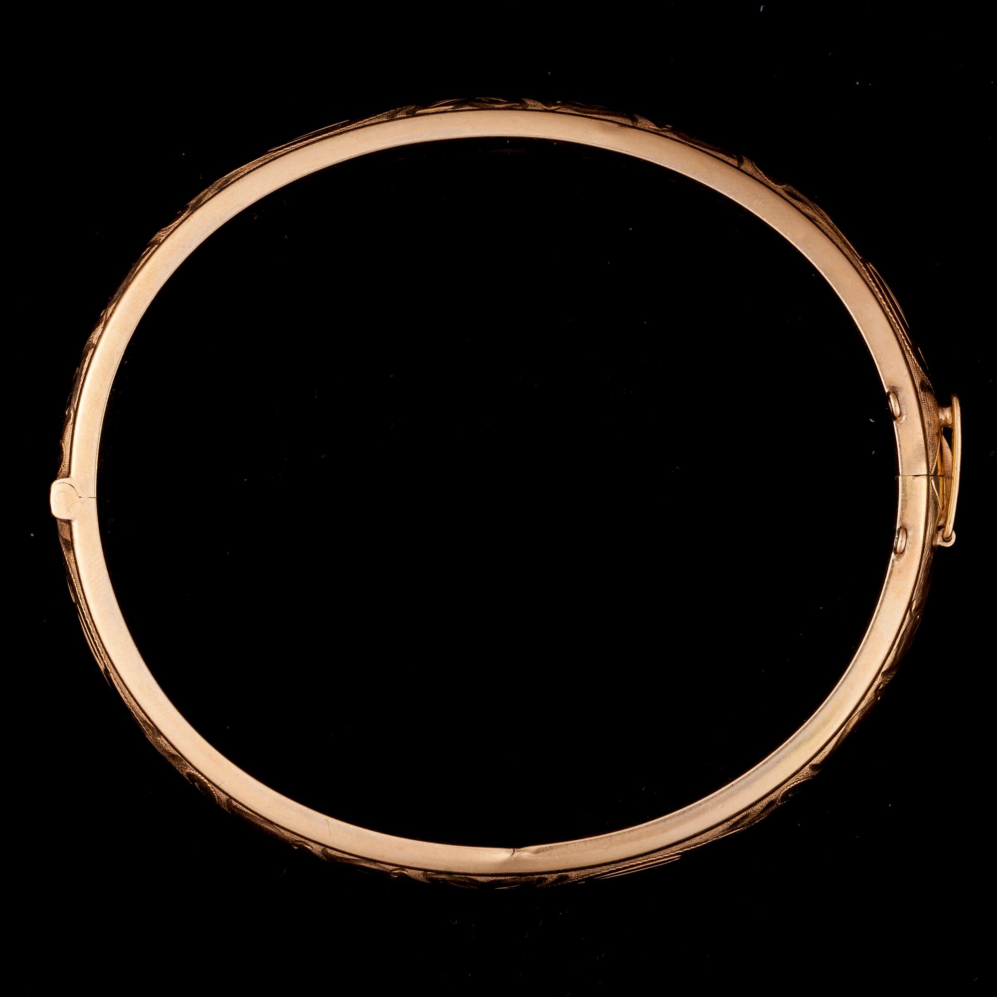 ARMBAND, 14K guld, graverad dekoration. Vikt ca 20,6 g.