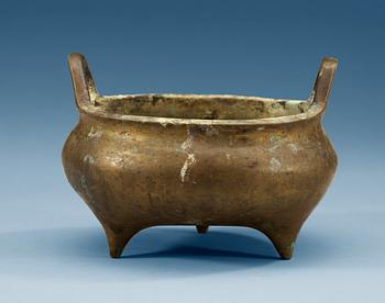 A bronze tripod censer, Qing dynasty with a inscription and Xuande mark, dated to sixth year of Xuande (corresponding to 1431).