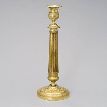 An early 19th century empire candlestick.