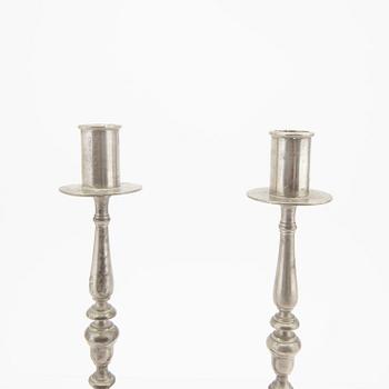 Firma Svenskt Tenn,  a pair of 1928 pewter candle sticks.