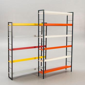A pair of 1950s Adriaan Dekker lacquered metal book shelves for Tomado Holland.