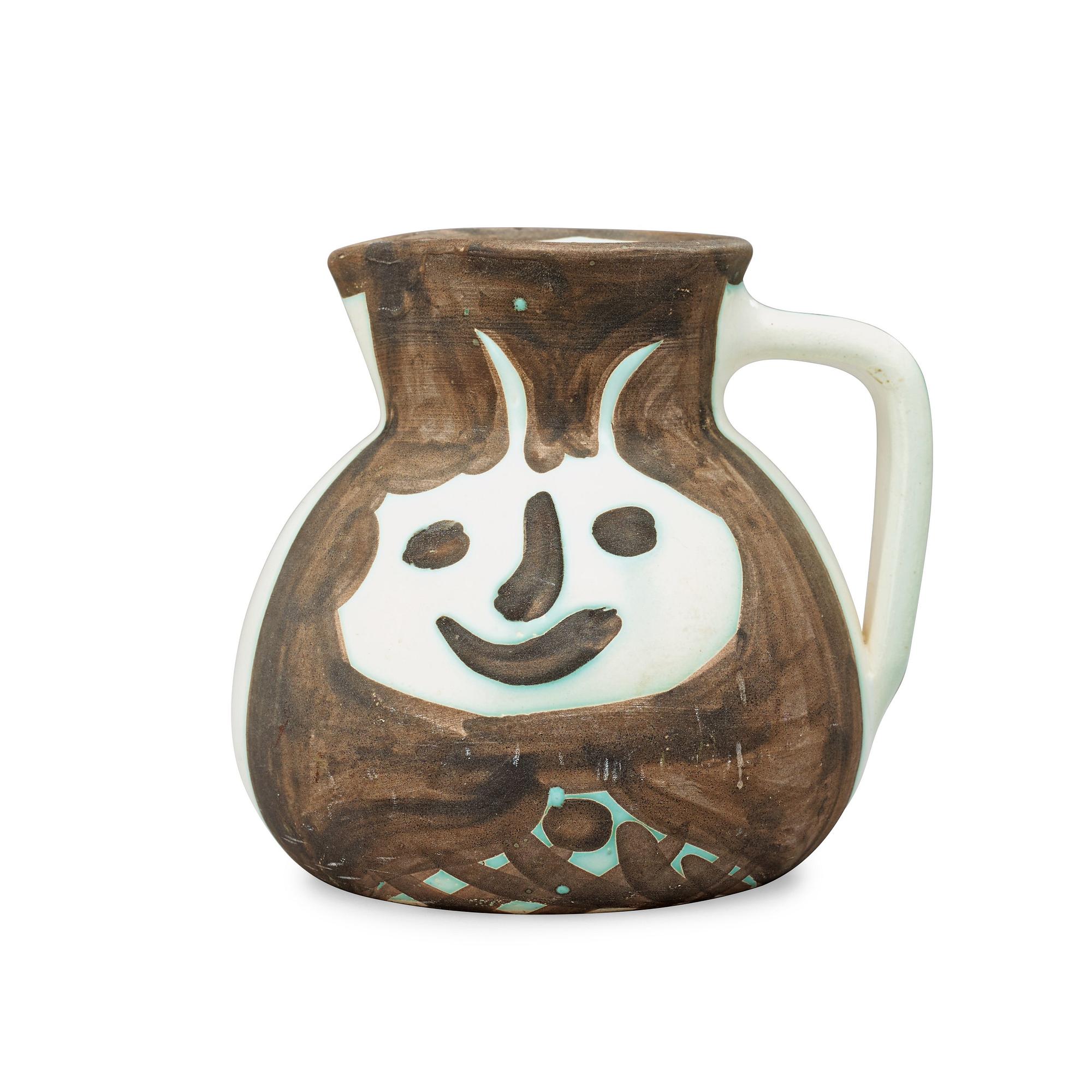 A Pablo Picasso 'Têtes' faience jug, Vallauris, France 1956.