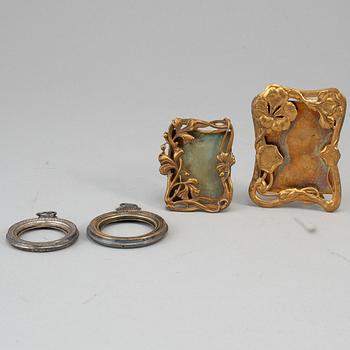 Four silver och metal miniature frames, ca 1900.