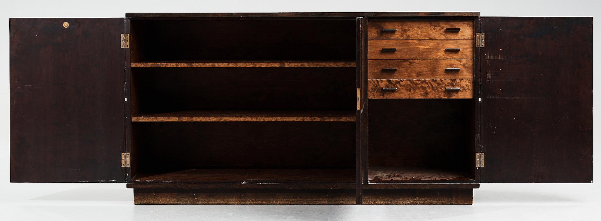Axel Einar Hjorth, a darkly stained birch sideboard,"Typenko", Nordiska Kompaniet, Sweden 1932.
