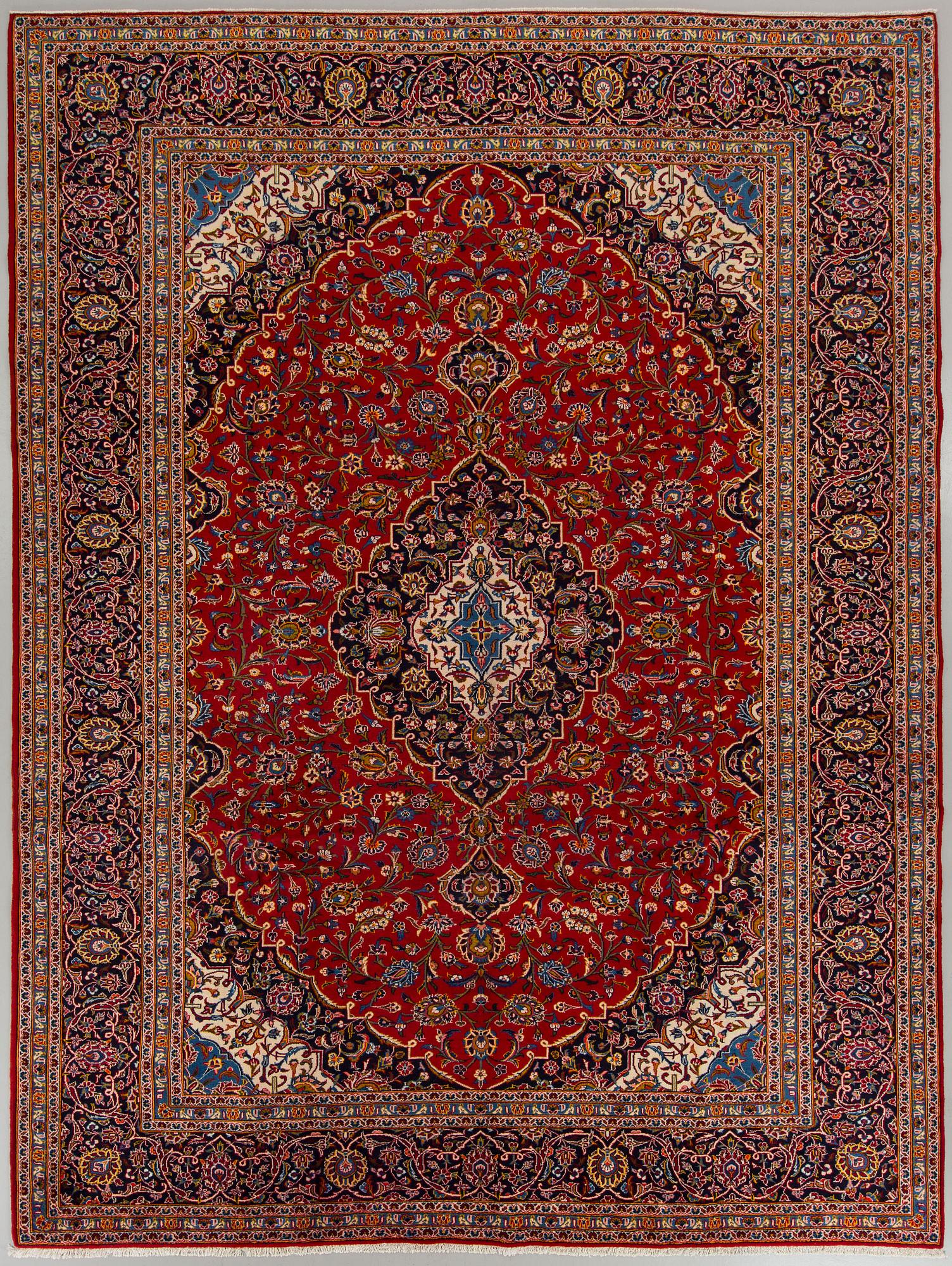 An old Keshan carpet ca 409 x 308 cm.