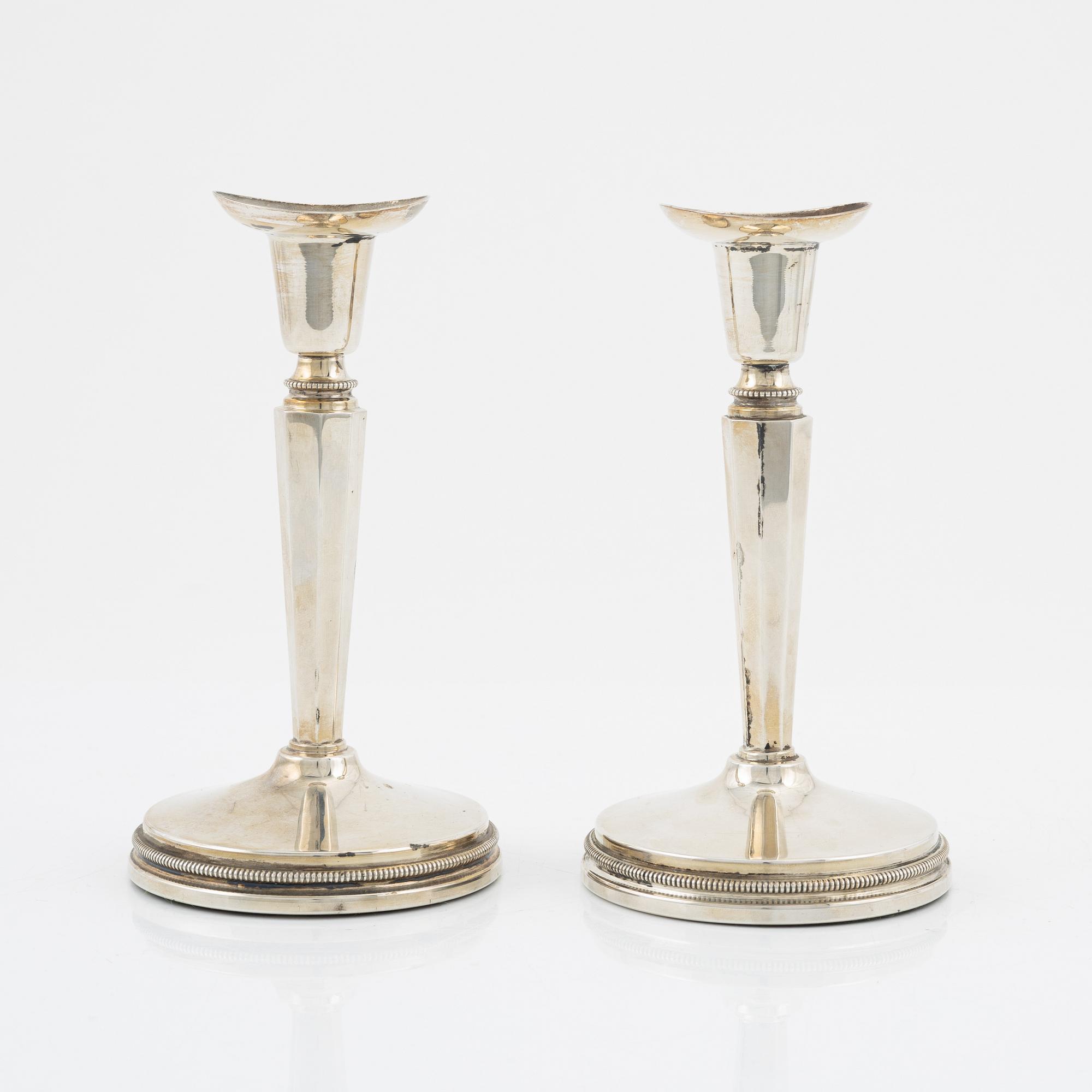 Eric Löfman, ljusstakar, ett par, silver, MGAB Uppsala, 1986.