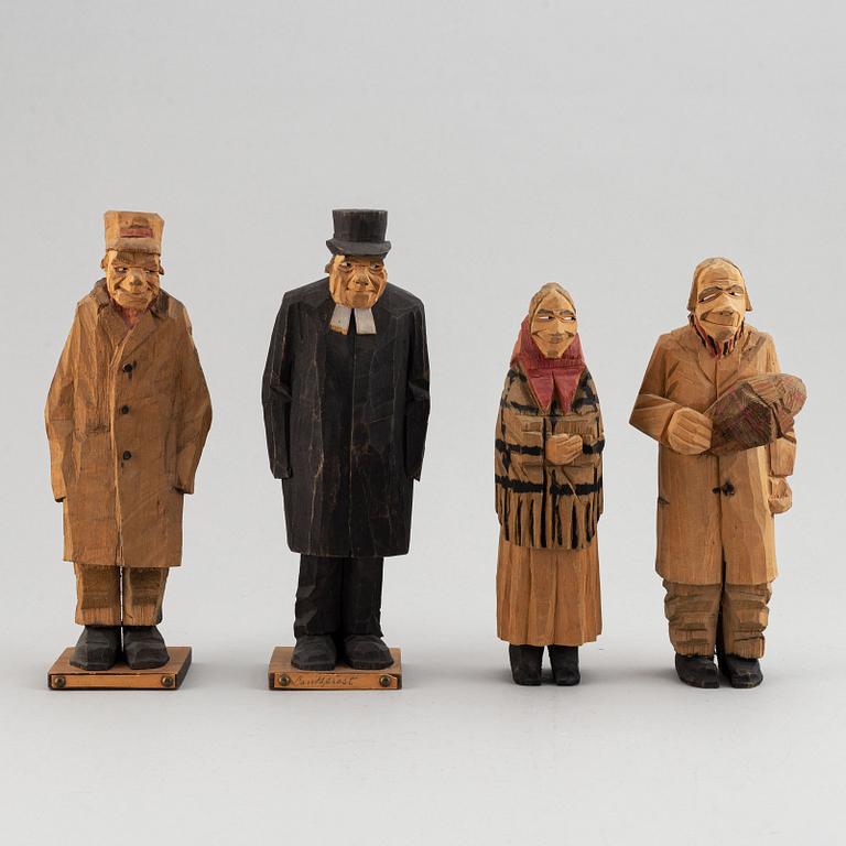 Four Carl Johan Trygg wooden sculptures, two signed and dated 1918.