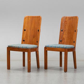 Axel Einar Hjorth, a pair of stained pine "Lovö" chairs, Nordiska Kompaniet, Sweden 1930's.