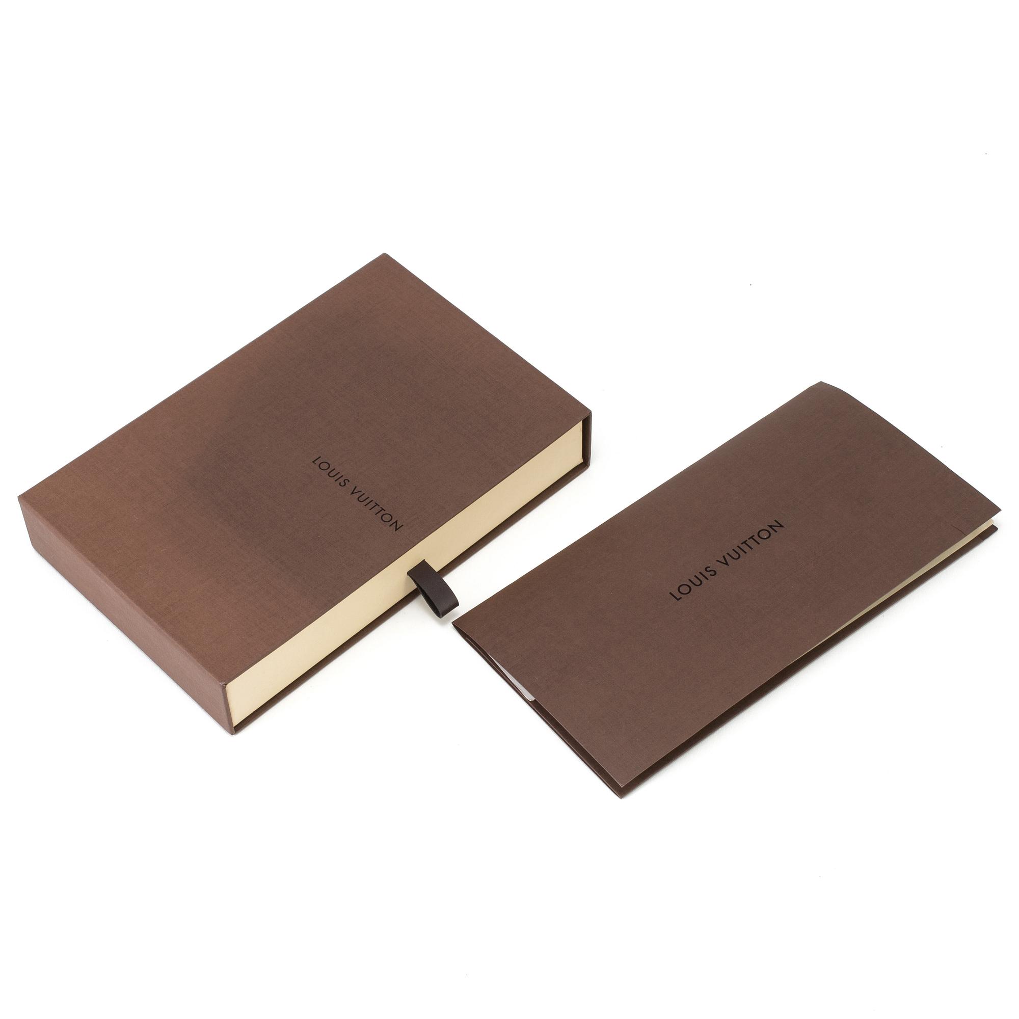 Black epi-leather small ring agenda cover by Louis Vuitton 2015.