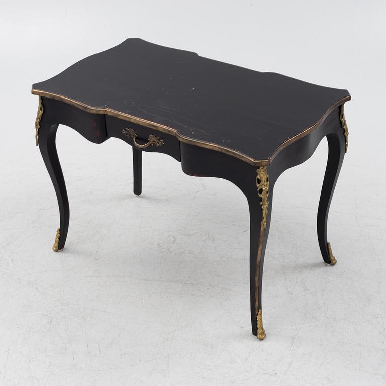 A rococo-style desk from the second half of the 20th century.