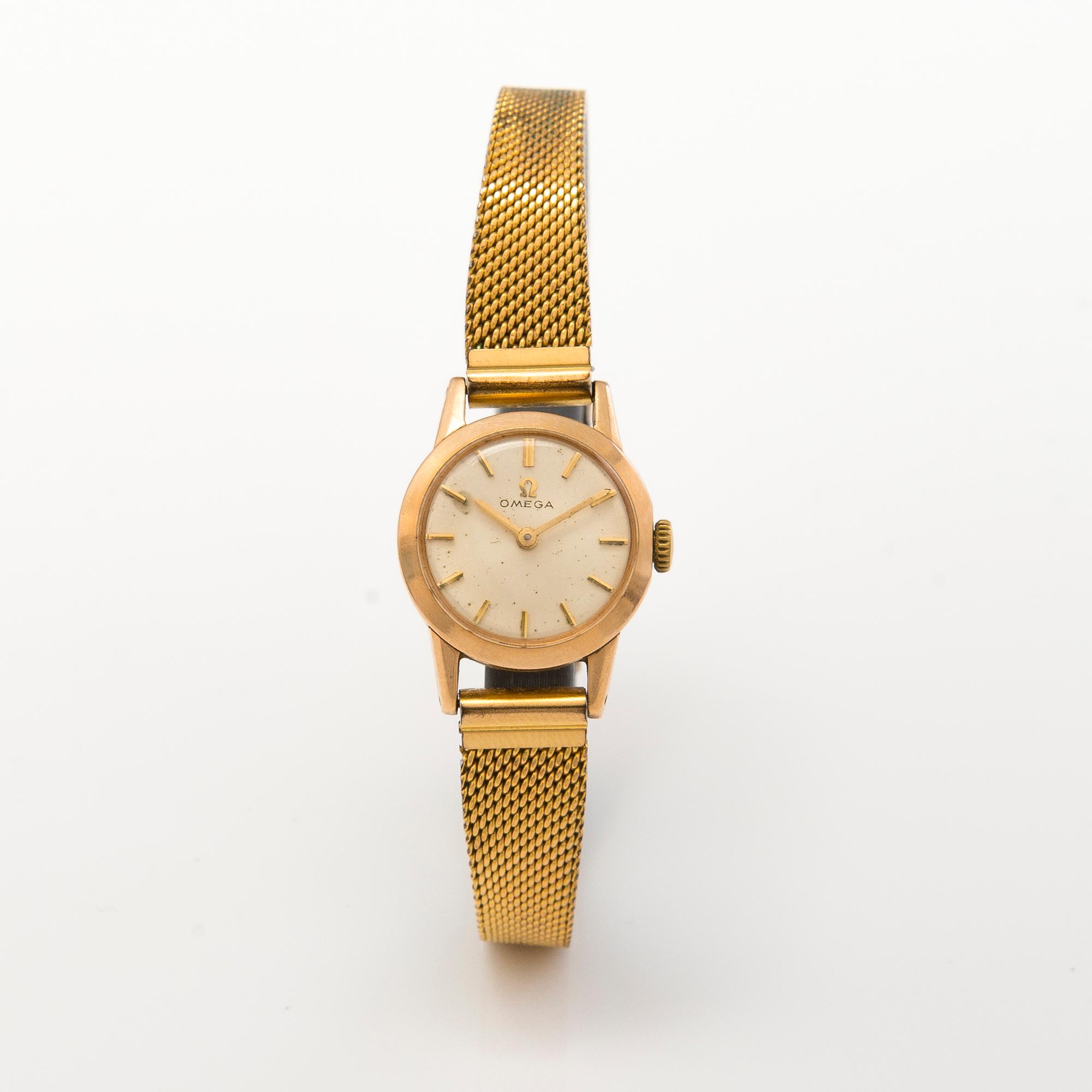 OMEGA wrist watch, manual winding, 14K gold and steel, 20 mm.