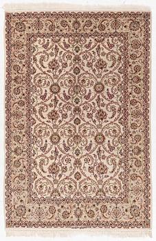 An Isfahan part silk rug, c. 161 x 110 cm.