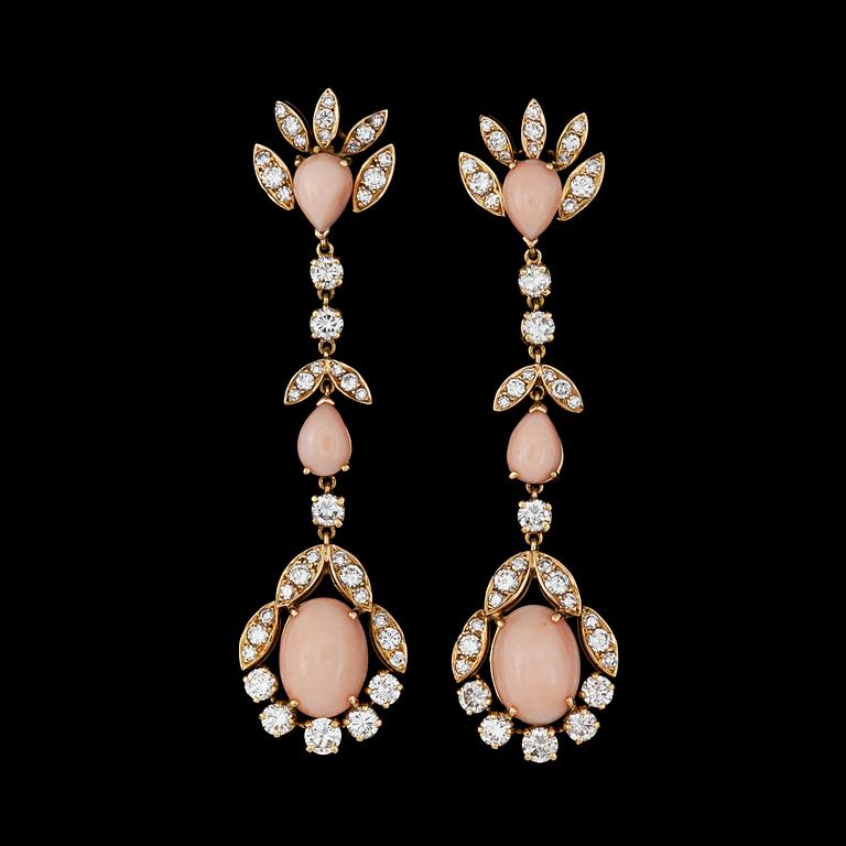 A pair of angel-skin coral and diamond earrings. Total carat weight of diamonds circa 3.90 cts.
