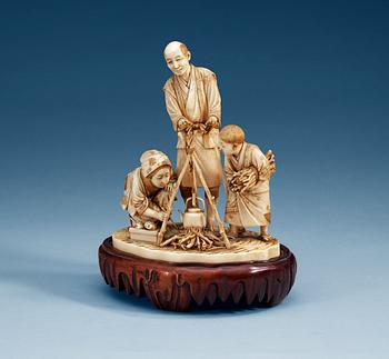 1504. A sectional ivory Okimono, Japan, circa 1900.