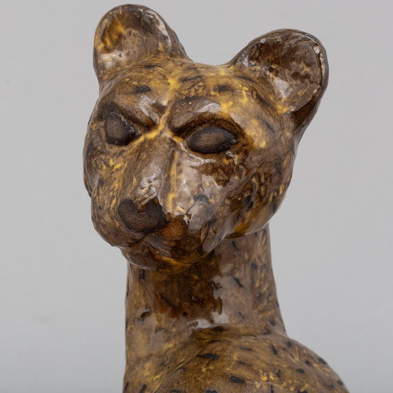 Vicke Lindstrand, a glazed ceramic sculpture of a cheetah, model 3003, Upsala-Ekeby, Sweden ca 1949.