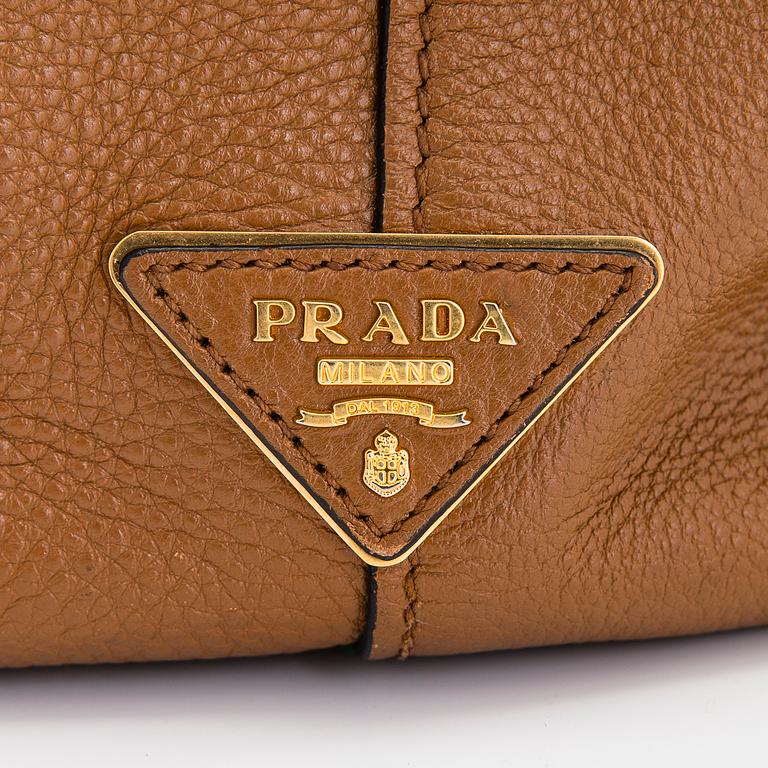 Prada, a "Vitello Phenix" leather bag.