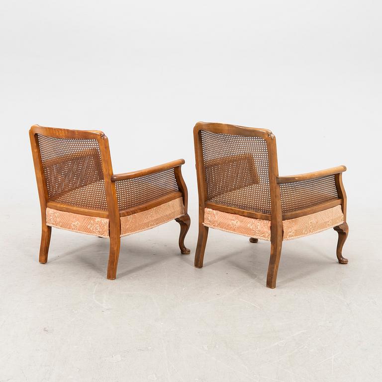 A pair of 1940/50s armchairs.