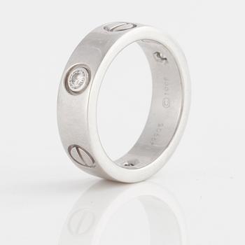 A brilliant-cut diamond "Love" Cartier ring.