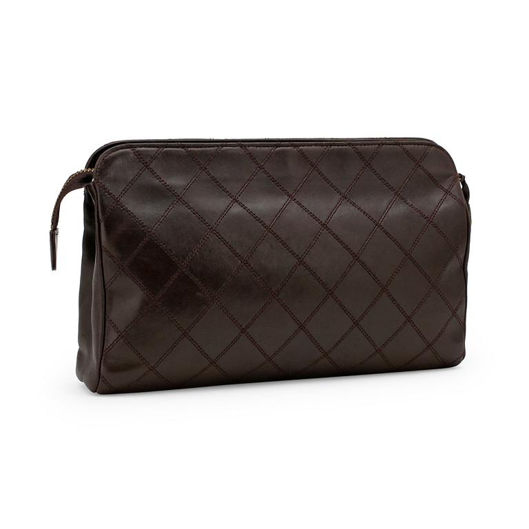 CHANEL, a brown leather clutch bag.