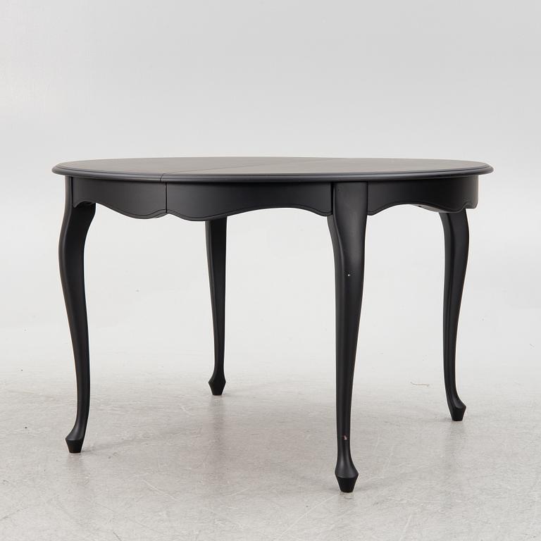 A rococo style dining table, second half oif the 20th century.