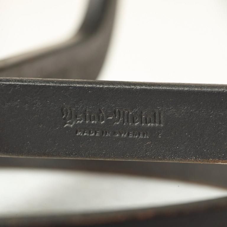 Gunnar Ander, a set of three iron and glass candlesticks for Ystad Metall, Sweden, mid 20th century.