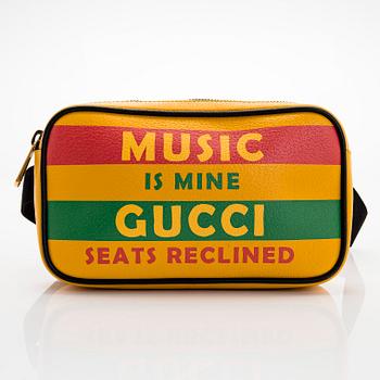 Gucci, A 'Music is mine' waist bag.