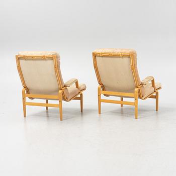 Bruno Mathsson, a pair of 'Ingrid' armchairs, Dux, Sweden, second half of the 20th century.