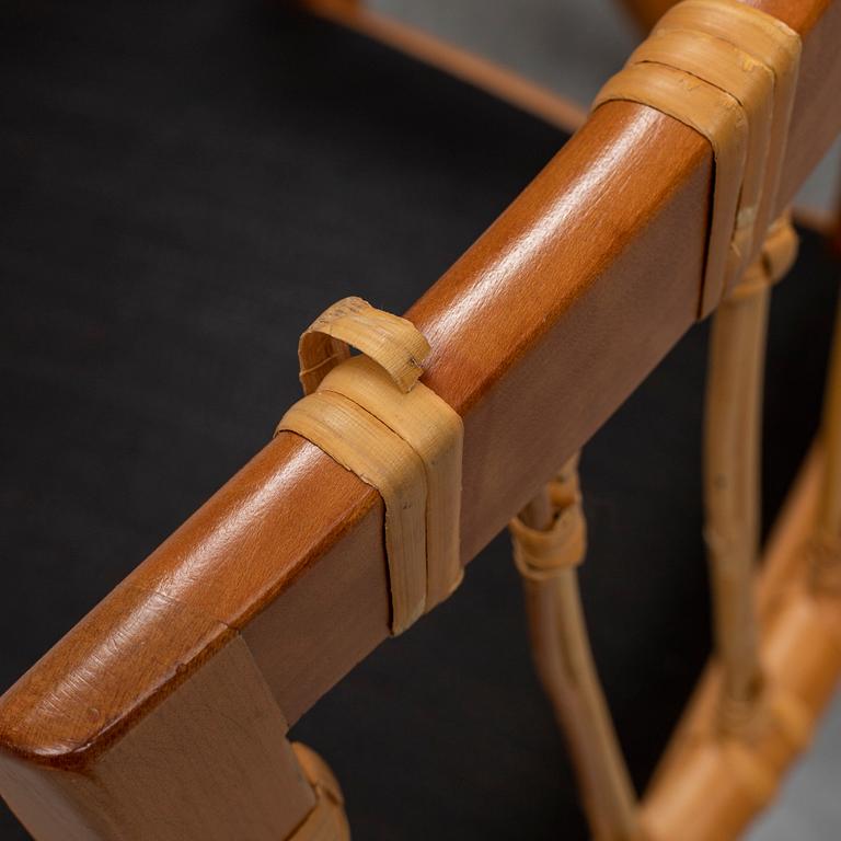 A pair of mahogany and rattan dining armchairs, Josef Frank, , model 1165, Svenskt Tenn, Stockholm.