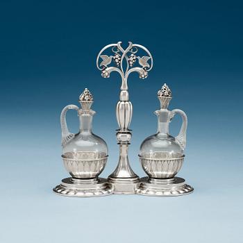 708. A Georg Jensen 830/1000 silver cruet-stand, Copenhagen 1921.