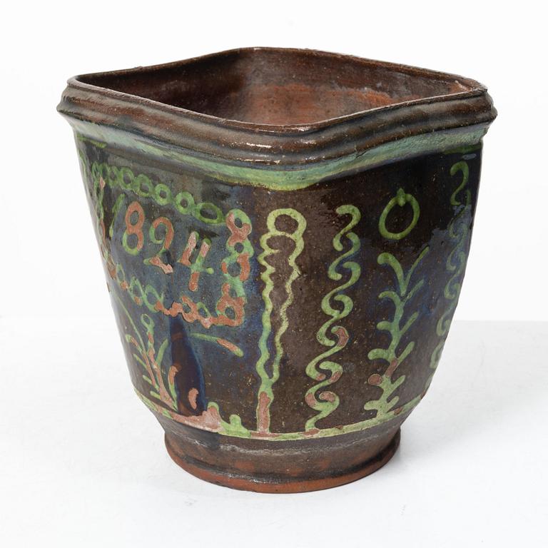 Stoneware planter and stand, dated 1824.