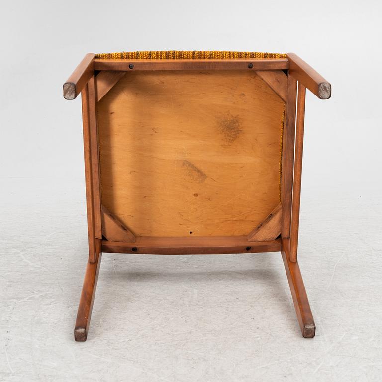 A dining table and four chairs, second half of the 20th century.