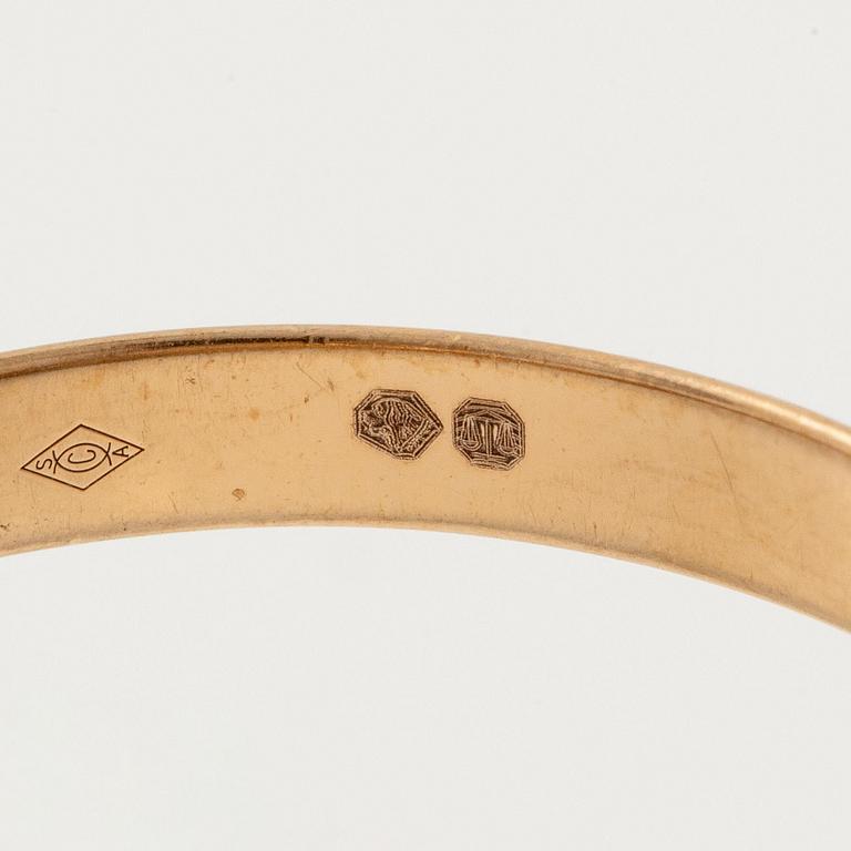 A Cartier "Trinity" ring 18K gold in three colours.