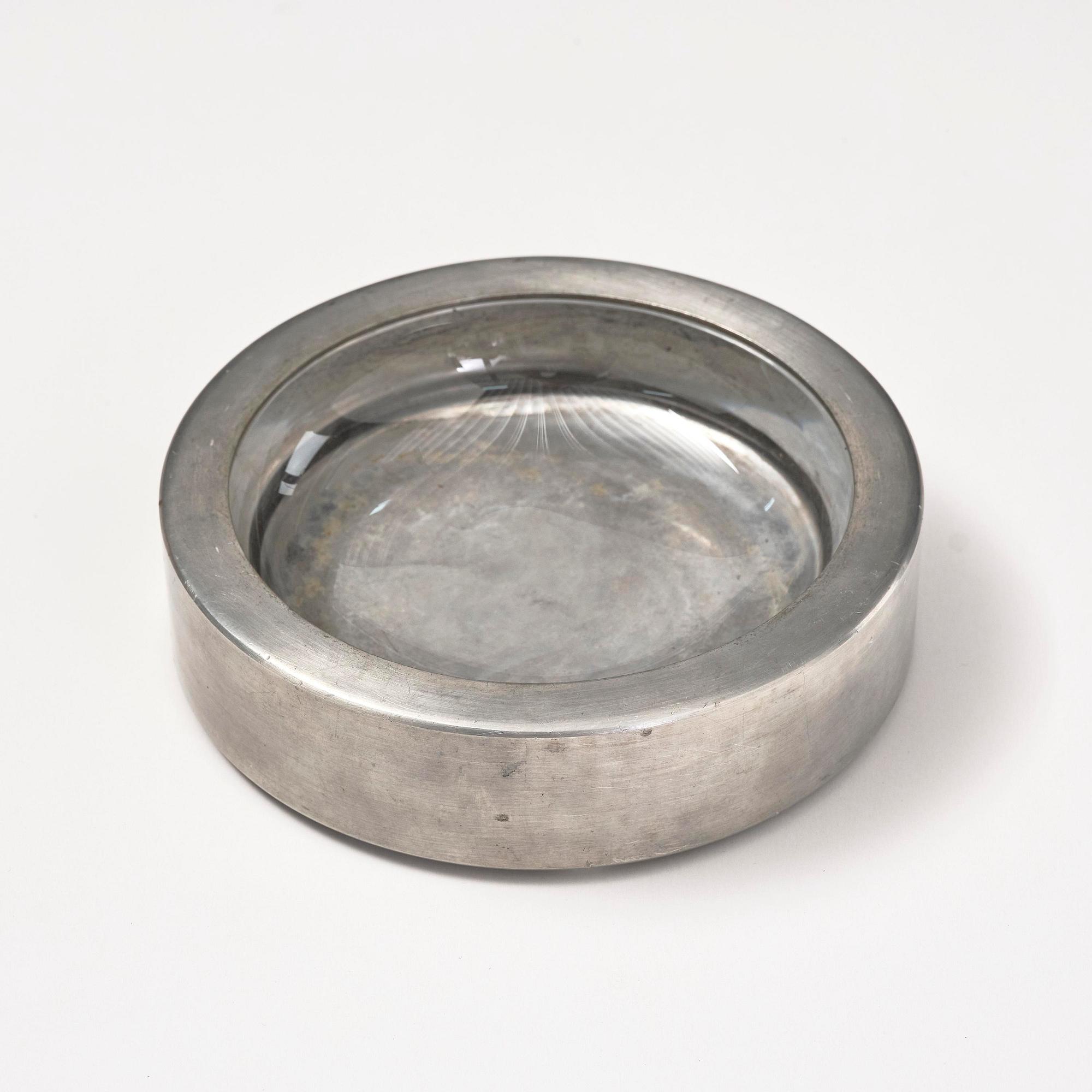 Firma Svenskt Tenn, a pewter and glass ashtray/bowl, Stockholm, 1950.