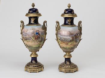 A pair of large bronze mounted vases with covers, France, second half of 19th Century.