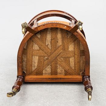 An Empire armchair, 19th century.